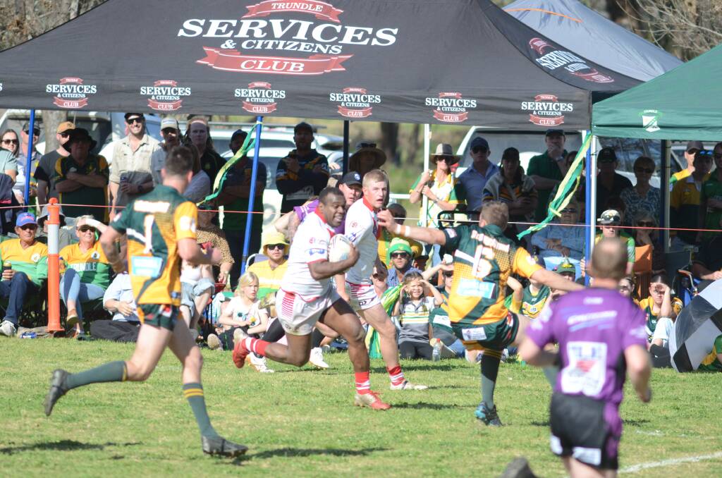 Manildra Rhinos fullback Joey Lasagavibau in full flight in front of Trundle Boomers fans. Picture by Dominic Unwin