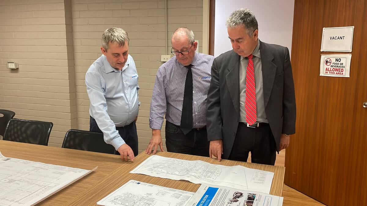 Wangarang's Scott Lindsay, Kevin McGuire and Gary Norton inspect the plans for the new facility. Picture by Dominic Unwin