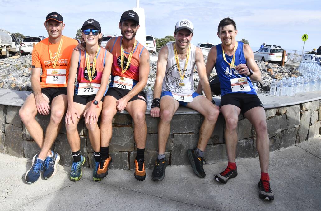 Sam Collins (second from right) is excited for the future of running in Orange. Picture by Jude Keogh