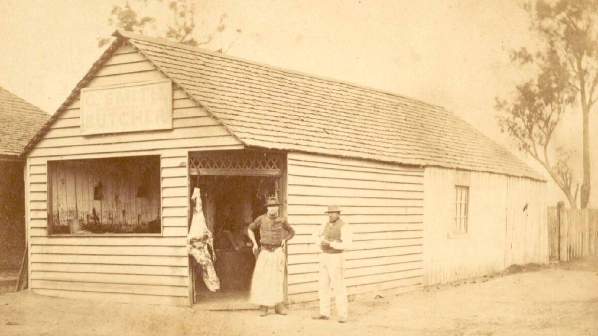 Two men outside C. Smith butcher store, Hill End [?], New South Wales, ca. 1872. Picture from the Holtermann Collection of Photographs via the State Library of NSW.