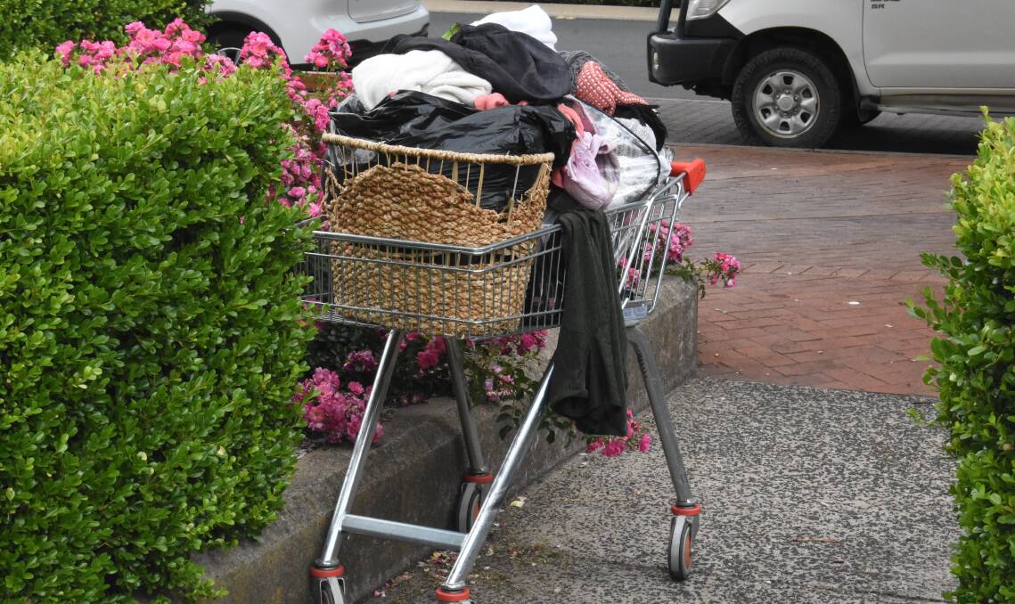 A Coles shopping trolley holds the belongings of a rough sleeper outside of Robertson Park on Wednesday. Picture by Riley Krause.