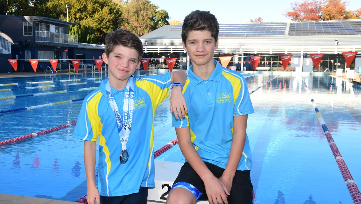Ruben and his brother Vincent, who taught him breaststroke and butterfly. Picture by Carla Freedman. 