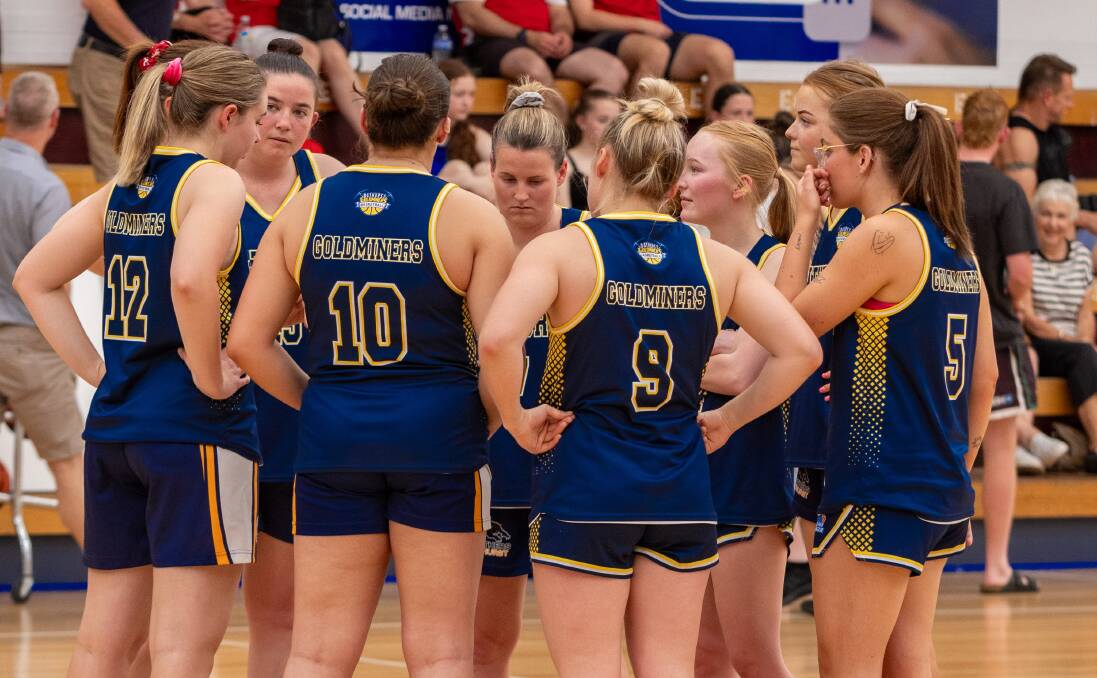 Bathurst Goldminers come together during Sunday's grand final win over Lithgow Lazers. Picture by Kyle Simpson