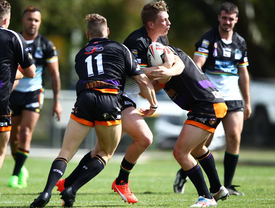 TOO GOOD: Jack Siejka (with the ball) was amongst the try scorers, in a dominate display against the Dragons in Mudgee on Sunday.. Photo: PHIL BLATCH