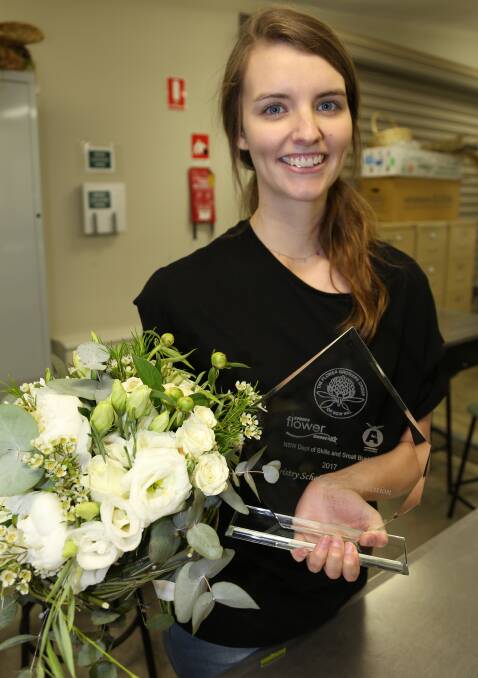 BUDDING OPPORTUNITY: TAFE student Kalea Blowes with her Flower Growers Group of NSW Scholarship award. Photo: CONTRIBUTED