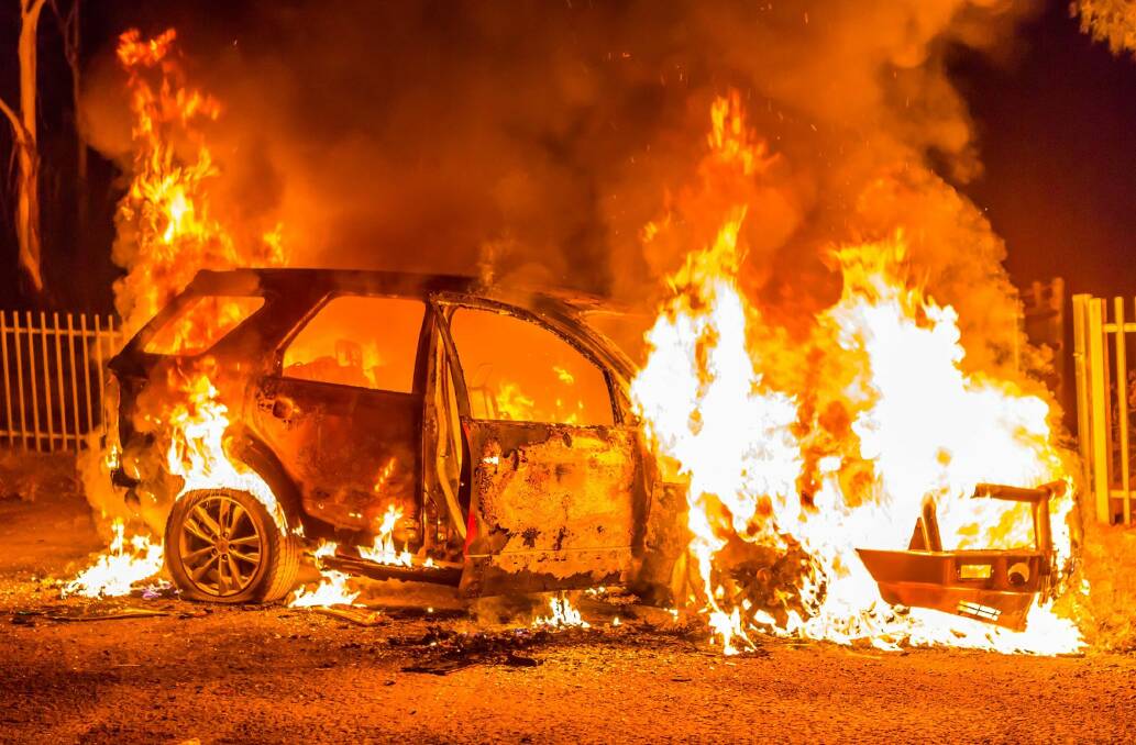 Images of burning and burned-out cars published by the Central Western Daily