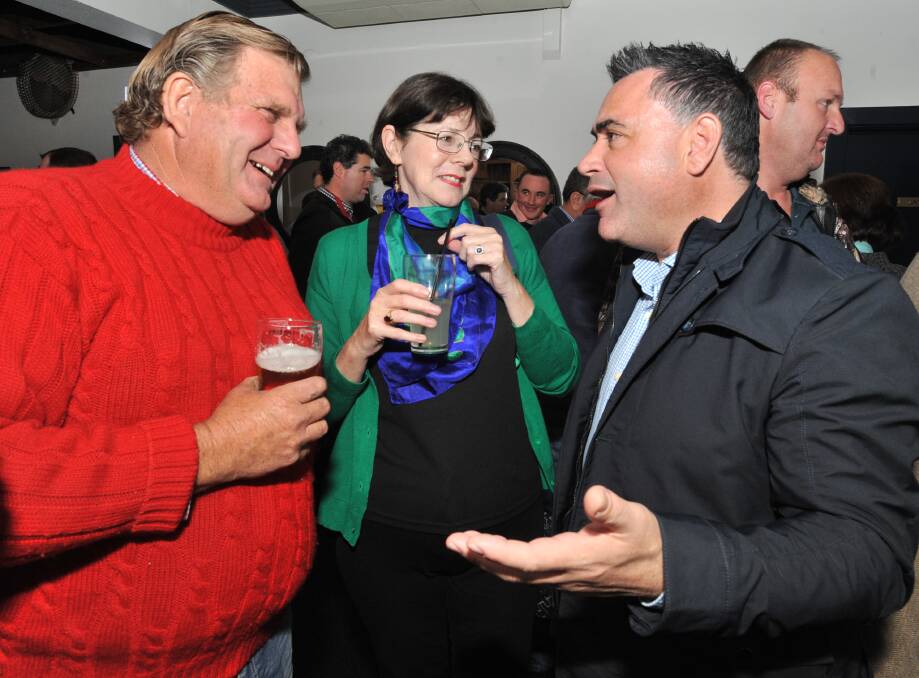NICE TO SEE YOU HERE: NSW Deputy Premier John Barilaro (right) speaking to Richard and Katie Hazelton at last week's Pollies in the Pub event. Photo: JUDE KEOGH