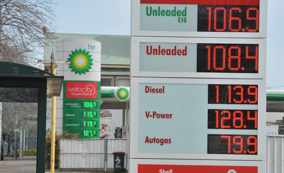 TIMES HAVE CHANGED: Two fuel boards display petrol prices in Orange on Tuesday. Photo: JUDE KEOGH 0830jkpetrol