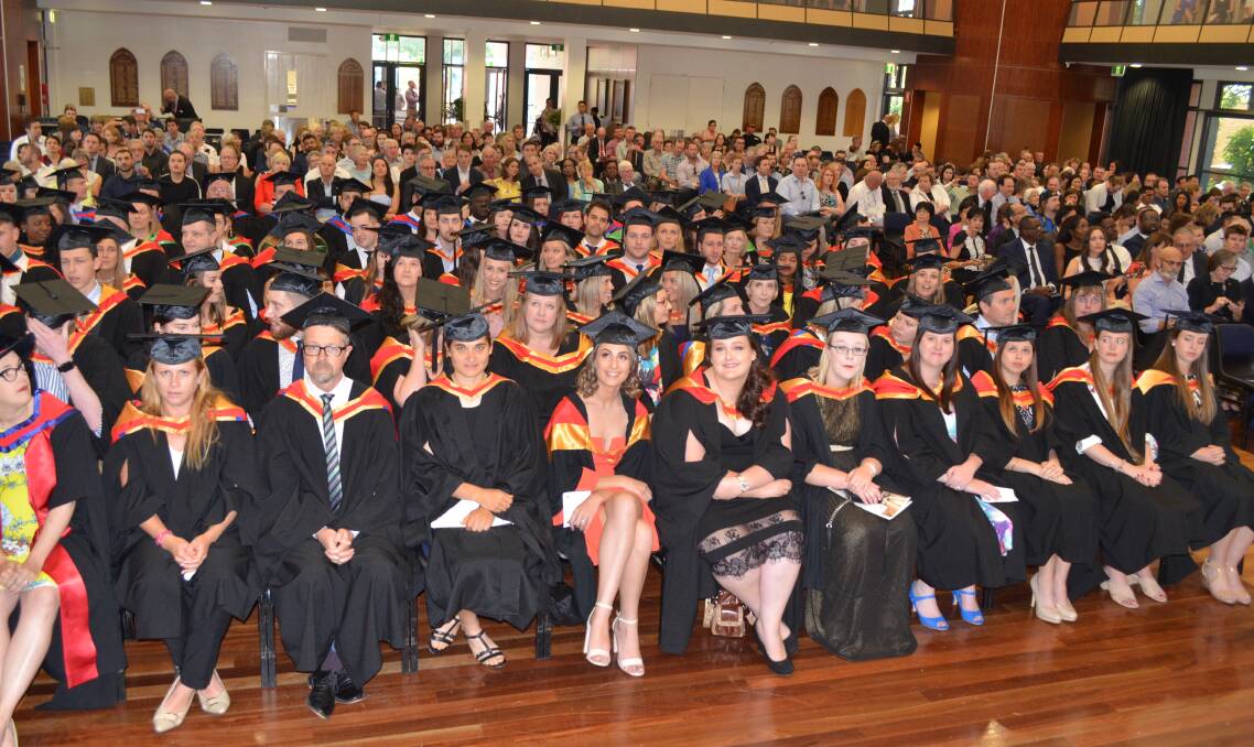 DRESSED FOR THE OCCASION: Charles Sturt University graduates during last week's ceremony.