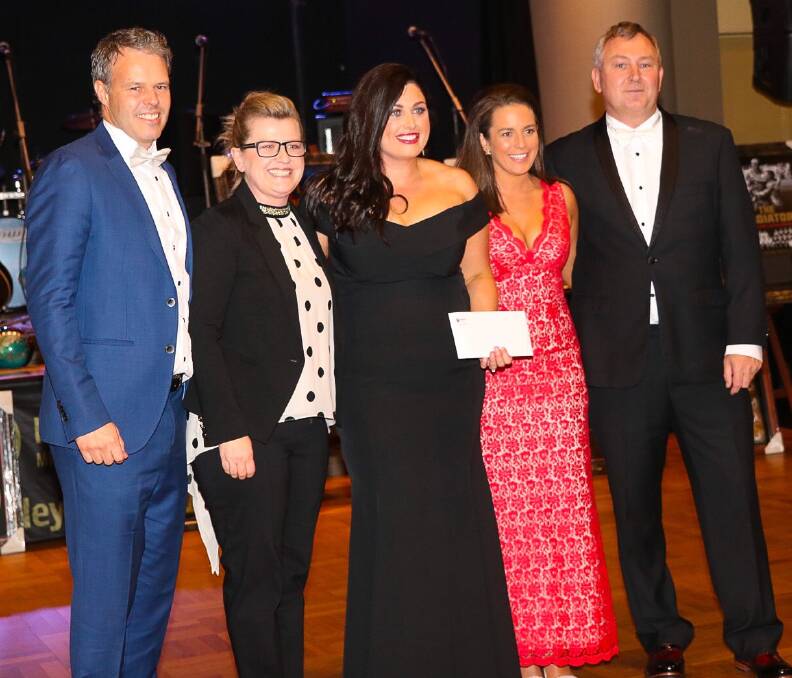 Housing Plus's Justin Cantelo, Penny Dordoy and David Fisher (right) with Newcrest's Melissa O’Brien and Emma Pratten at Friday night's White Tie Ball. Photo: CONTRIBUTED