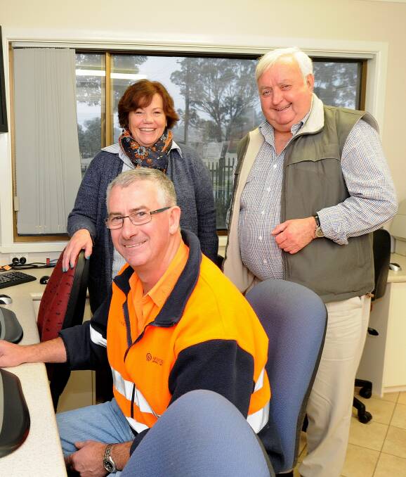 CONNECTING BOWEN: Cadia Valley Operations general manager Tony McPaul, Bowen Community Technology Centre manager Paula Townsend and Bowen Residents Action Group president Ron Gander. Photo by Steve Gosch
