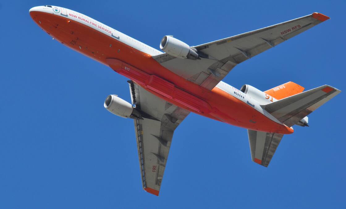 GIANT HELP: The DC-10 Air Tanker being deployed to drop another mass of water on the fire.