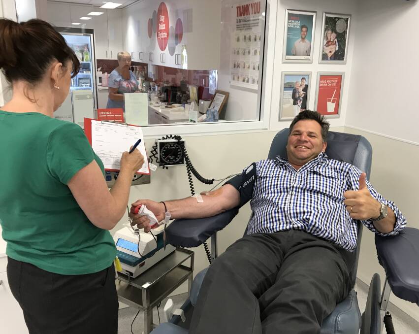THUMBS UP: Member for Orange Philip Donato donating some much-needed blood at the Orange Blood Donor Centre. Photo: CONTRIBUTED