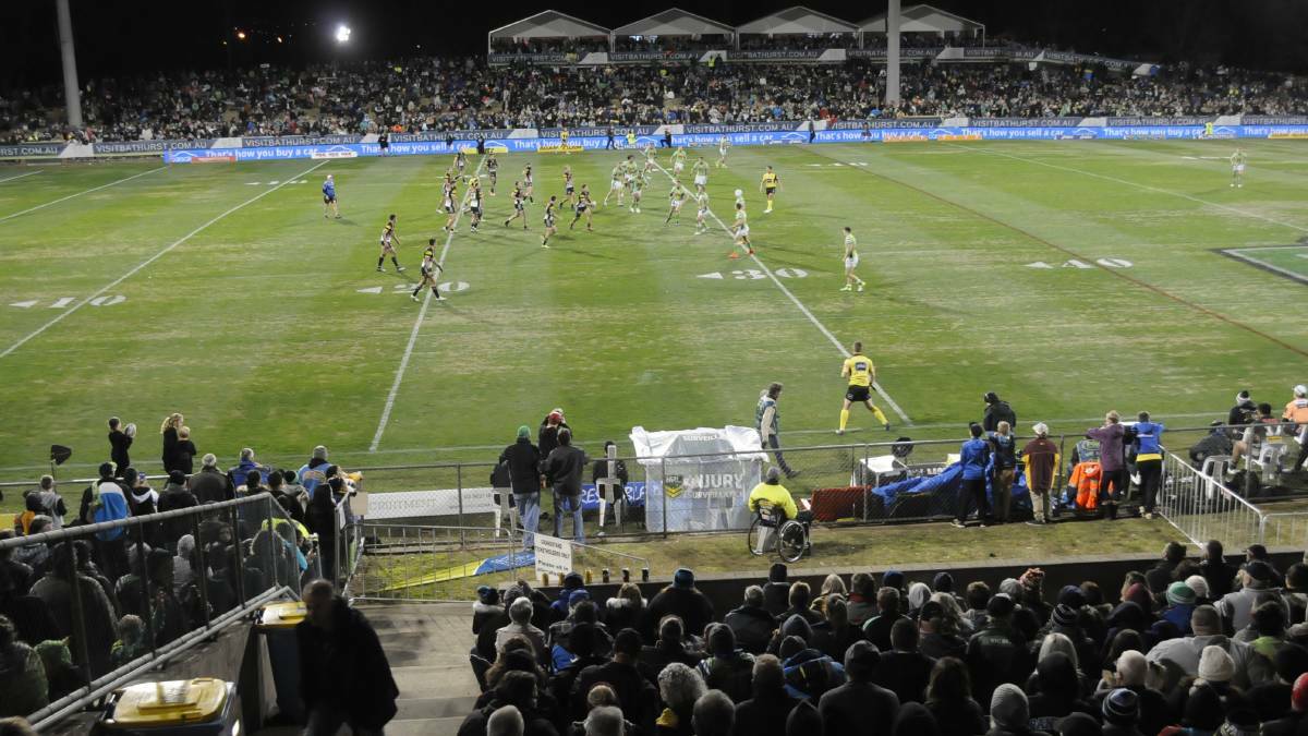 ON SALE: The crowd at this year's Penrith Panthers versus Canberra Raiders clash at Bathurst's Carrington Park.