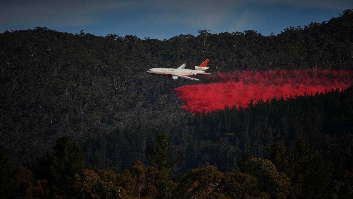 The DC-10 continues firefighting efforts. Photo: SCOTT GILBANK