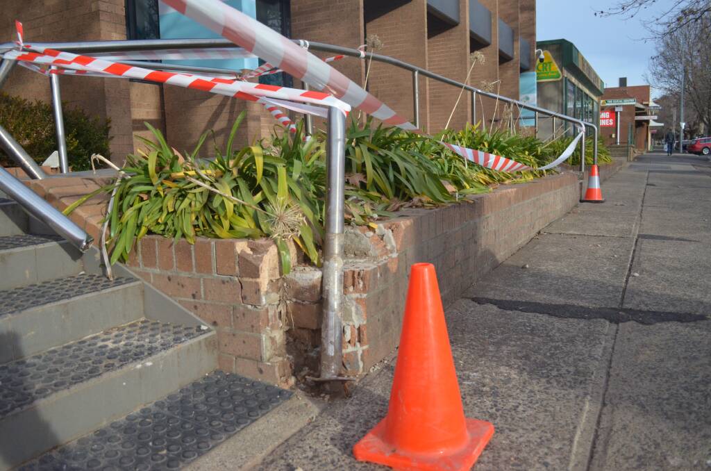 The impact of the dual-cab ute on the entrance to the Services NSW building