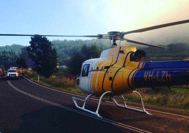 READY FOR ACTION: The Airbus AS350 that pilot Ben Surawski was flying during water-bombing operations at Mount Canobolas this week. Photo: BEN SURAWSKI 021418heli2