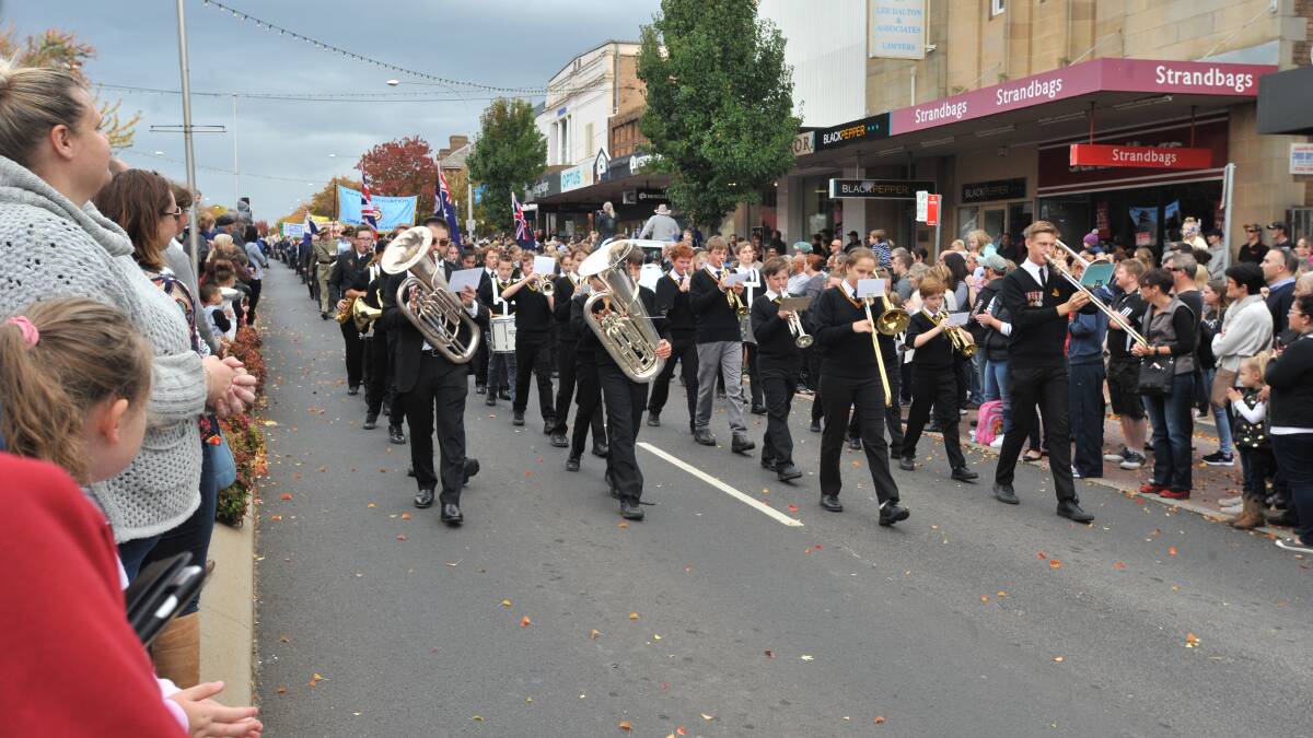 ON SONG: The Orange High School band marching down Summer Street and performing with aplomb on Anzac Day. Photo: JUDE KEOGH 0425jkanzac6