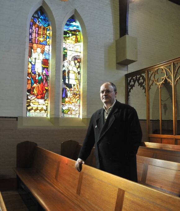 CHURCH HISTORY: Heritage architect James Nicholson revealed some of the fascinating history of Holy Trinity Anglican Church and the surrounding buildings during a history talk on Saturday. Photo: JUDE KEOGH 0625jktrinity