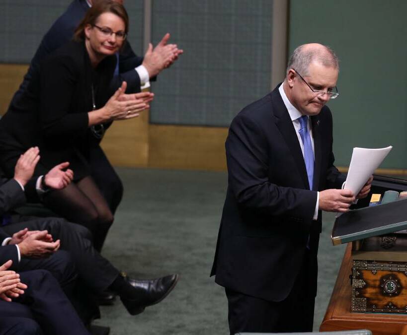 WELL RECEIVED: Treasurer Scott Morrison delivered the 2016 Budget, much to the appreciation of his front bench. His plan included many alterations to superannuation legislation. Photo: BENDIGO ADVERTISER