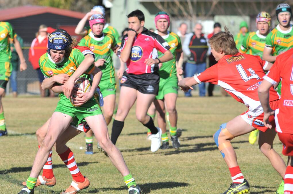 PRECAUTIONS: Players in Orange CYMS under 16s side decked out in headgear during their semi-final against Mudgee Dragons in Blayney on Saturday. Photo: JUDE KEOGH