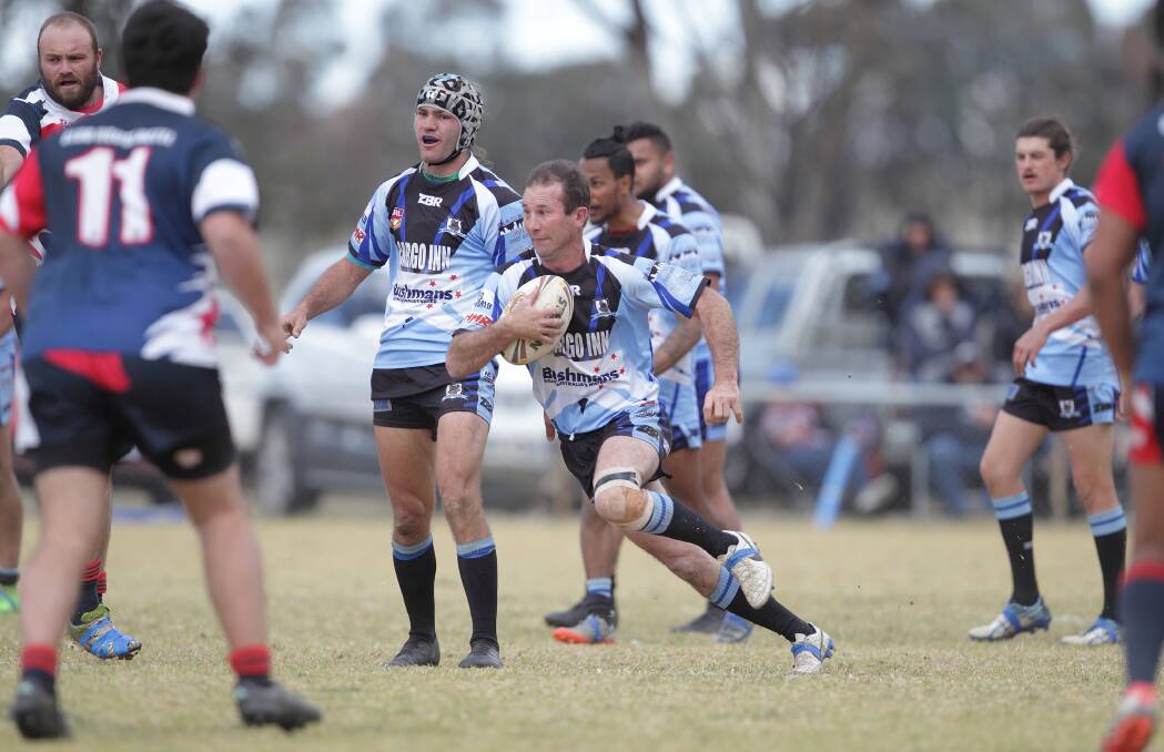 THEY'RE THROUGH: The Cargo Blue Heelers proved too good for the Peak Hill Roosters in Sunday's Woodbridge Cup final. Photo: RS WILLIAMS SPORTS