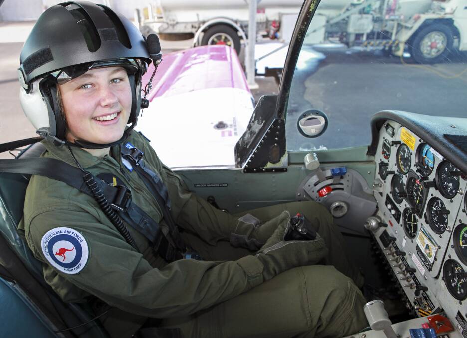 HANDS-ON EXPERIENCE: James Sheahan Catholic High School student Paris Capell gets familiar with the equipment she hopes she will one day use in a career with the Royal Australian Air Force. Photo: RAAF