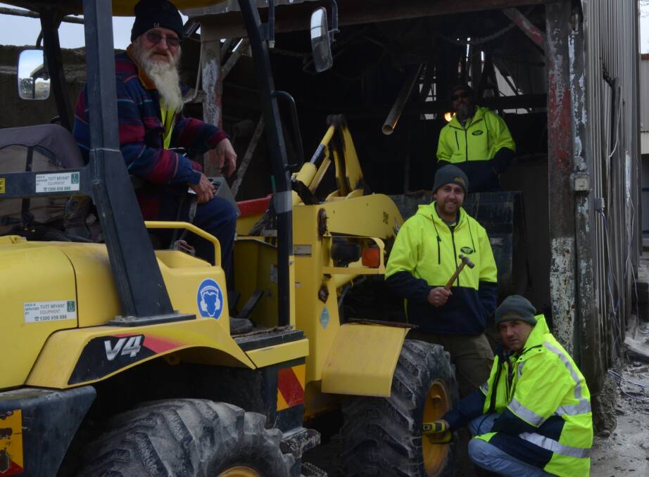 TIME FOR MAINTENANCE: Pigot's Mid Western Mini Mix workers Trevor Jones, Garry Bullen, owner Fraser Pigot and Ronnie Holland are carrying out maintenance work after access to building sites has halted due to the poor weather conditions. Photo: JANICE HARRIS 