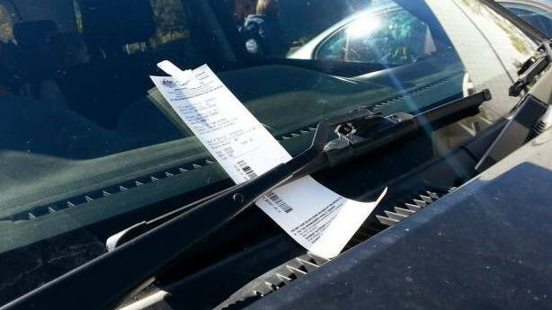 TICKET TEMPER: A visitor to Orange in November last year was not amused to find his vehicle had attracted a parking fine. Photo: DAILY ADVERTISER