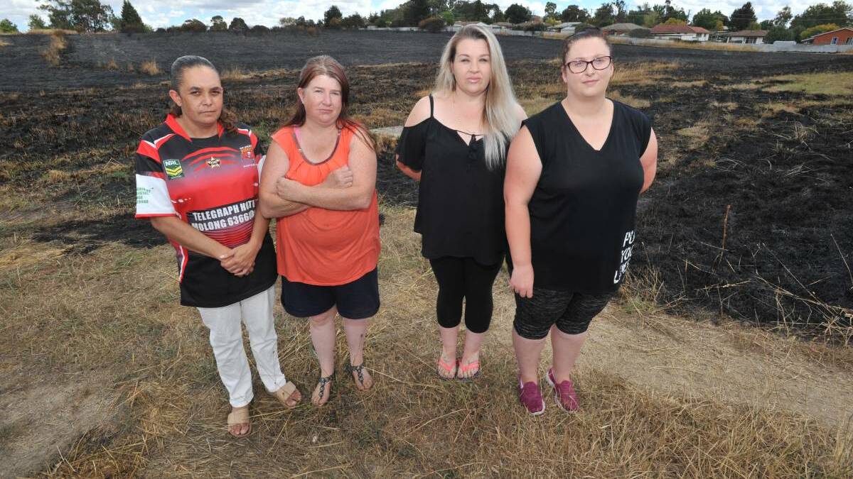 NOT HAPPY: Glenroi residents Lorrie Fuller, Melissa Hatton, Jessica White and Kelly McDonald at the site of March's fire. Photo: JUDE KEOGH.