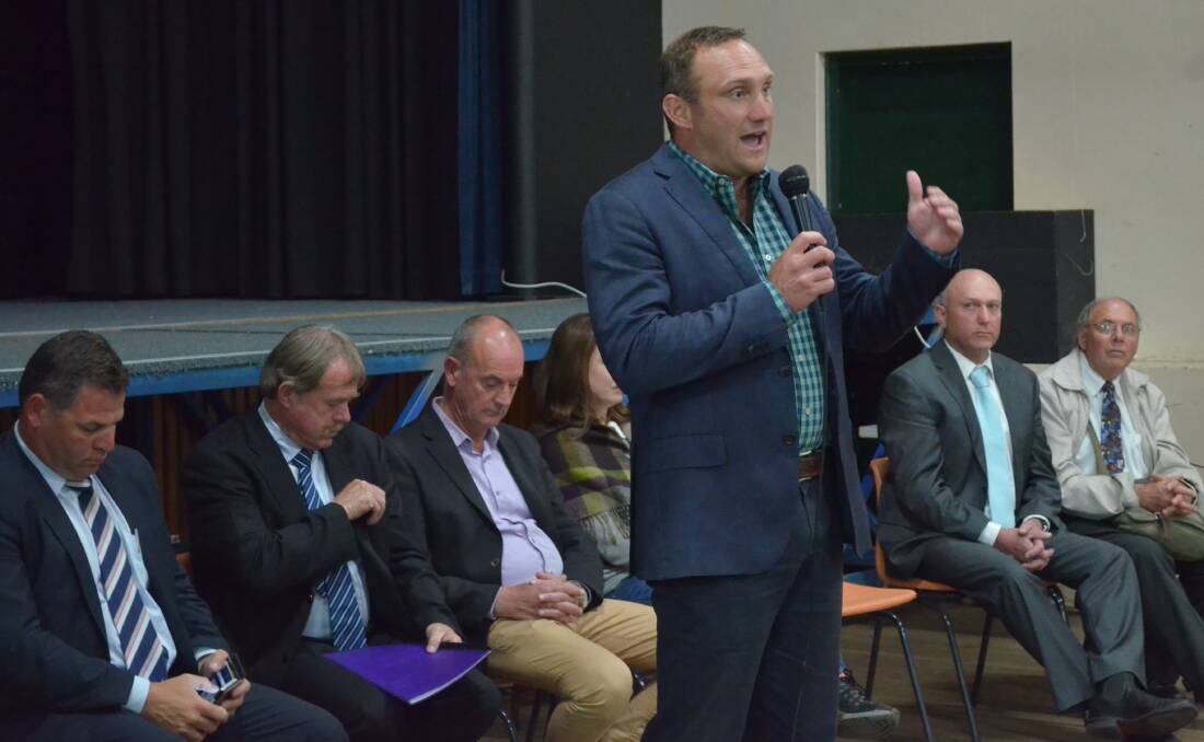 CHANCE TO SPEAK: Nationals candidate Scott Barrett addresses the town hall meeting held in Molong on Wednesday evening. Photo: DANIELLE CETINSKI