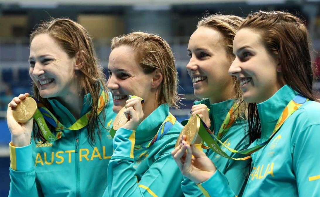SUCCESS STORY: Australia's Cate Campbell, Bronte Campbell, Emma McKeon and Brittany Elmslie proudly display their gold medals. Photo: ILLAWARRA MERCURY