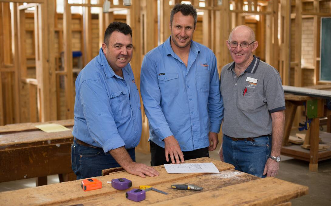 BUILDING KNOWLEDGE: TAFE NSW construction industry experts Matt White, Mark Penman and Mike Greer preparing for Tuesday night's forum. Photo: CONTRIBUTED