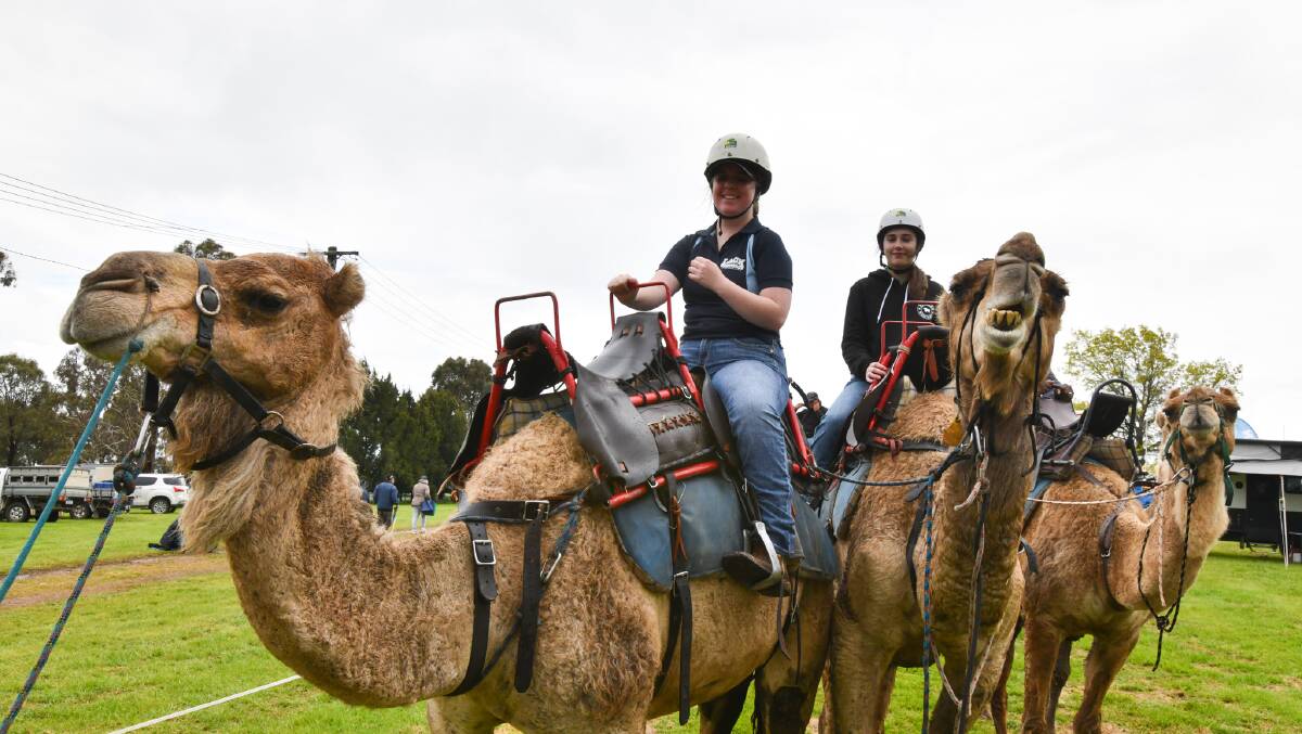 Zoe Keygan and Holly Brien at the camel rides at the 2022 Australian National Field Days. Picture by Carla Freedman