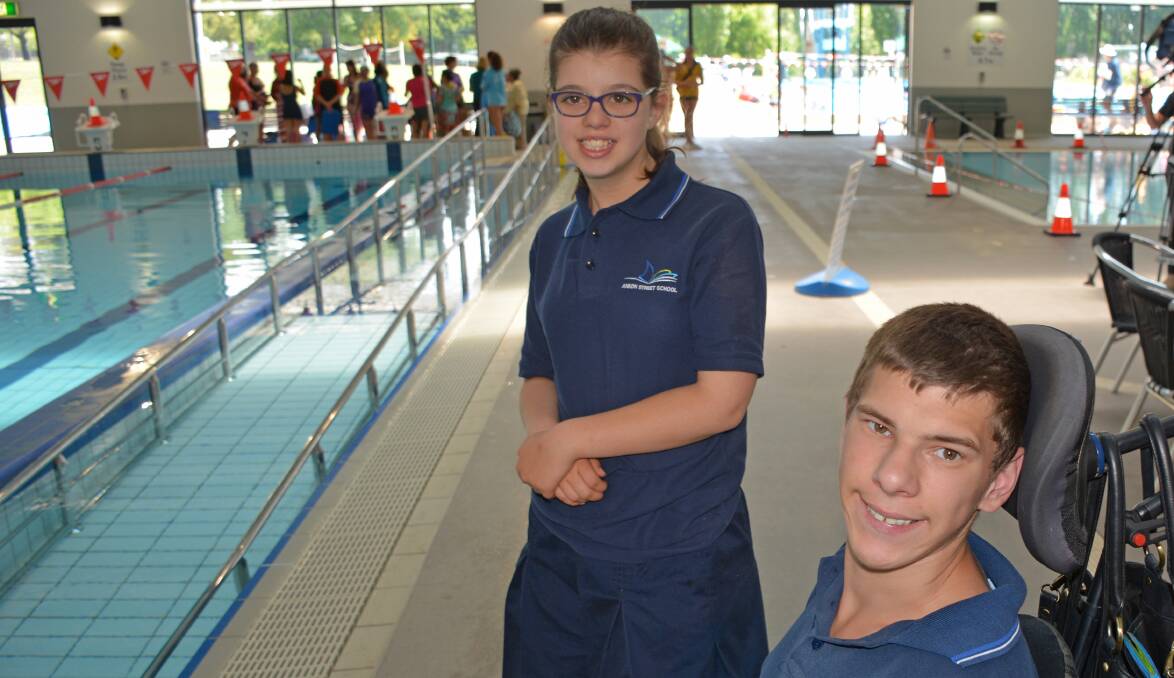 POOL PARTY: Anson Street School students Olivia Cavalli and Joseph Peters are looking forward to using updated change facilities at Orange Aquatic Centre. Photo: SUPPLIED