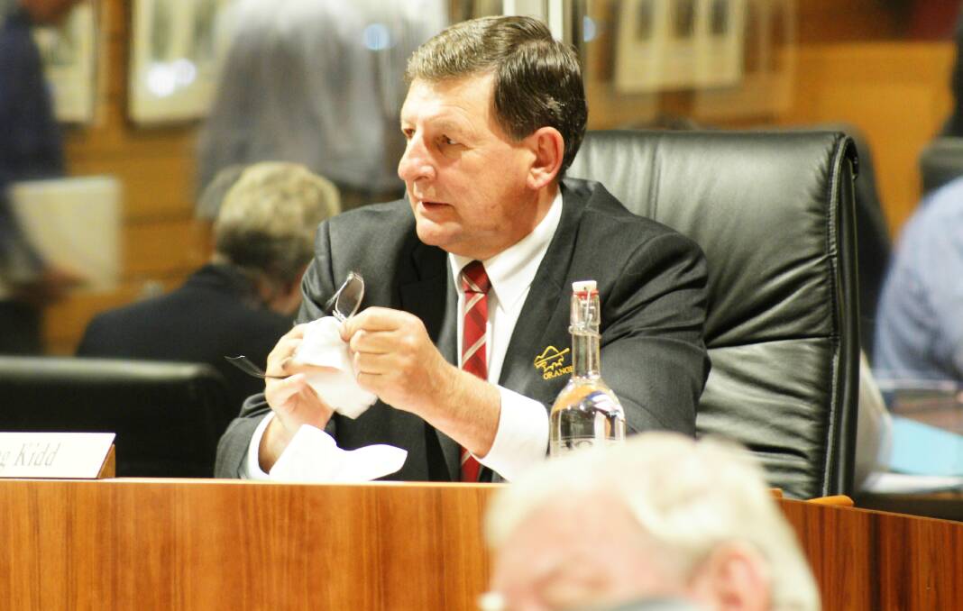 IN HIS SEAT: Councillor Reg Kidd at an Orange City Council meeting in September, 2009. Photo: FILE PHOTO