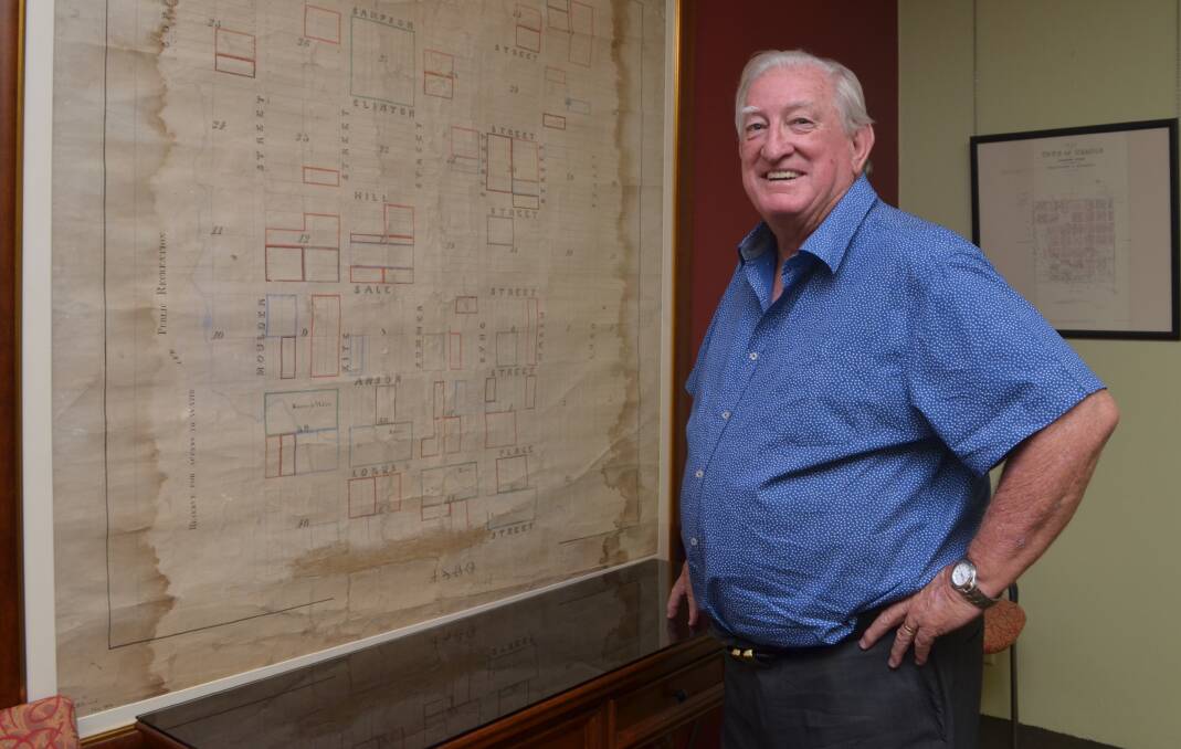 MOVING ON: Orange mayor John Davis, pictured with the original Municipality of Orange map, is hopeful to continue securing funding from the state government for council projects.