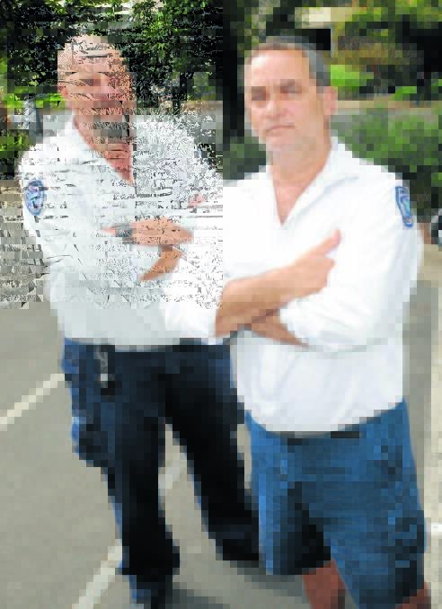 Orange City Council parking officers Ray Coleman and Joe Maric.