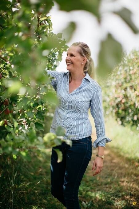 OPEN TO VISITORS: Hillside Harvest owner Sophie Jones, pictured in the orchard, decided to become involved in an agritourism trial. Photo: SUPPLIED