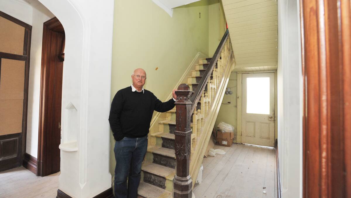 COSTLY: Denoc Holding director David Nock with Yallungah's staircase, which he said would have to be rebuilt if it was ordered to be retained. Photo: JUDE KEOGH 0504jkbyngst5