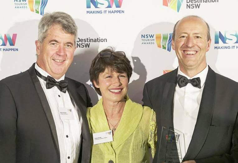 BRONZE: Council's Glenn Mickle with Pam and Trevor King from Lakeview Luxury Cabins at the 2016 awards. Photo: KYLE MANNING