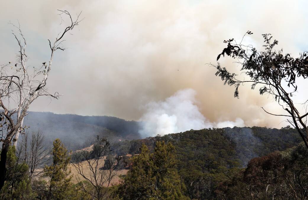 ON THE SCENE: The fire on Mount Canobolas on Wednesday morning.