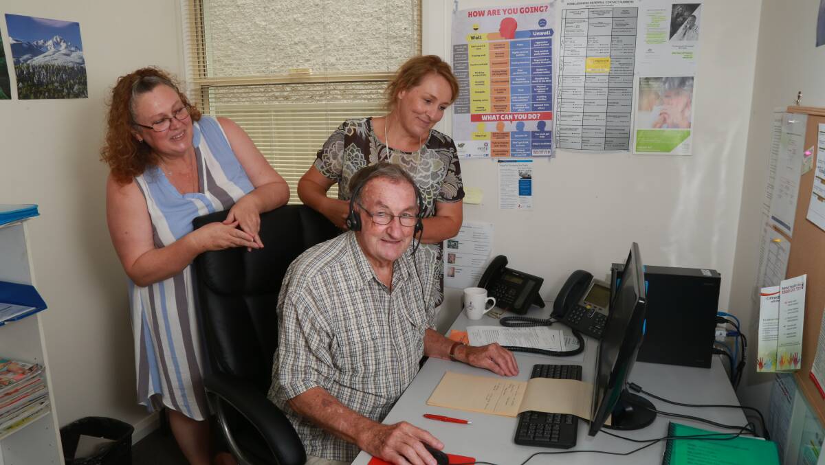 CALL ME: Lifeline volunteers Belinda Quinn and Ray Talbot, pictured with crisis support services manager Stephanie Robinson. Photo: PHIL BLATCH 012417pblifeline2