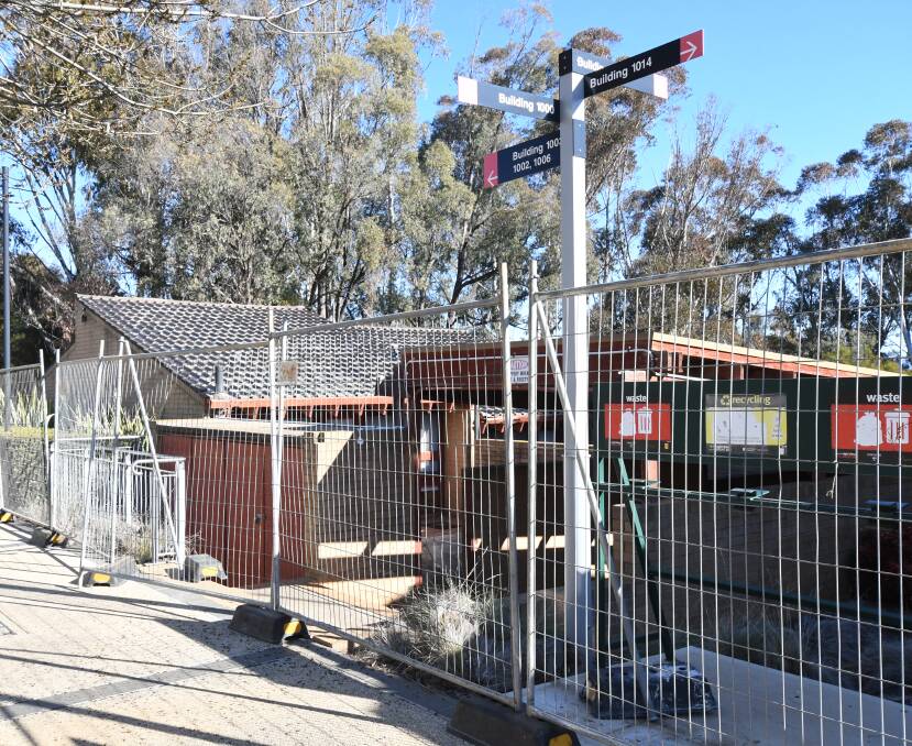 CONSTRUCTION SITE: Safety fences have been erected for the demolition of CSU buildings ahead of the medical school construction work. Photo: CARLA FREEDMAN