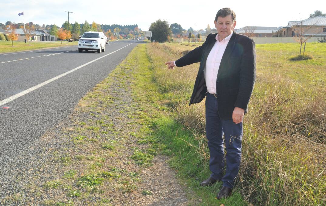 ACTION NEEDED: Cr Reg Kidd has highlighted the Escort Way as a road needing a footpath. Photo: JUDE KEOGH