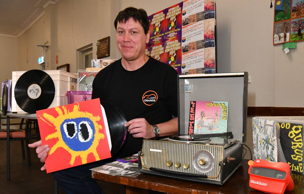 VINYL REVIVAL: Orange record fair organiser Patrick Coomey is bringing live music and rare records to town on Saturday. Photo: JUDE KEOGH 1114jkrecords4