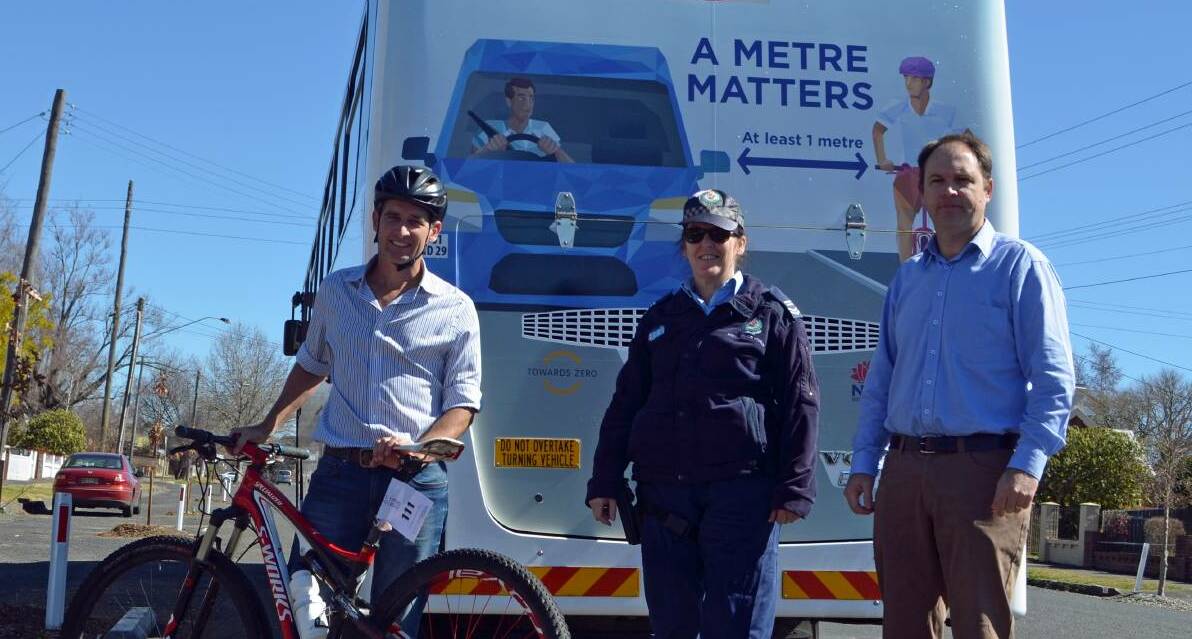 SAFETY: Then council cycling committee chair Steve Martin, Snr Constable Alison Hodge and Works Manager Wayne Gailey at last year's launch of the A Metre Matters campaign.