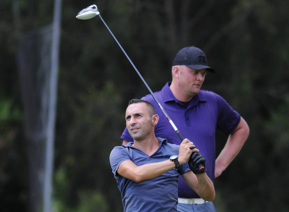 CAN'T GET ENOUGH: Costa Mavros and Todd Brakenridge will attempt another golf marathon at Wentworth on Wednesday, this time joined by Troy Swain. Photo: STEVE GOSCH
