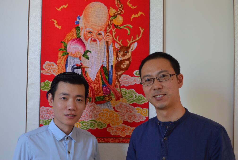 GOOD IDEA: John Cui and Dong Liu of the Orange Chinese Cultural Centre support an Asian hub.
