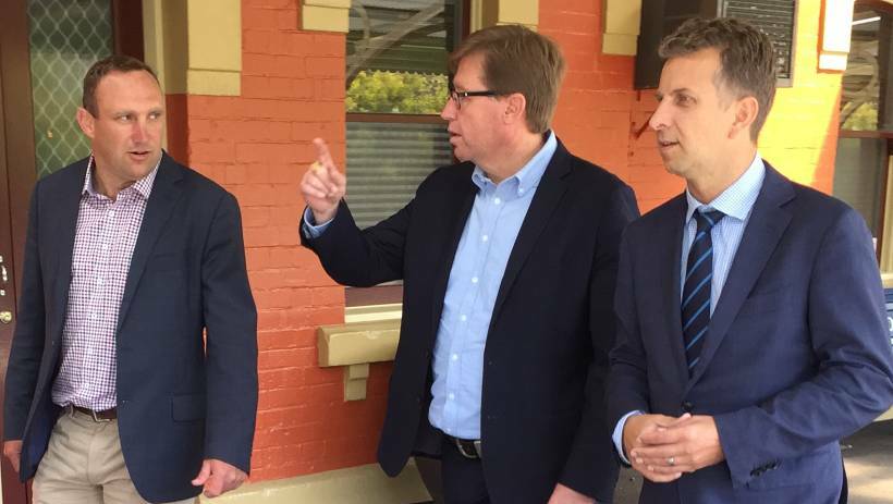 BACK THEN: Nationals byelection candidate Scott Barrett with Deputy Premier Troy Grant and Transport Minister Andrew Constance at the Orange railway station during the byelection. Photo: DAVID FITZSIMONS